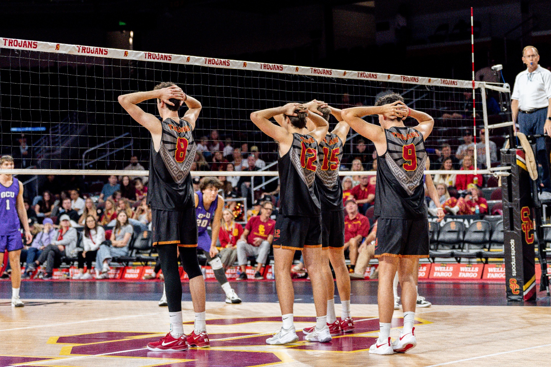 Caleb Blanchette (No. 9) at the net with USC teammates